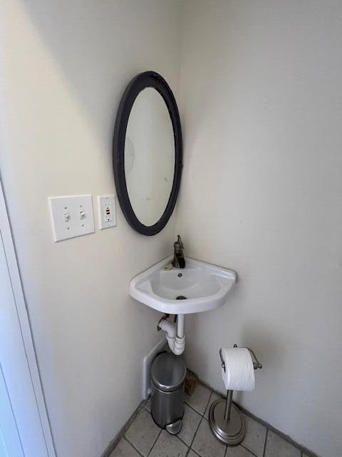 bathroom featuring sink and tile patterned floors