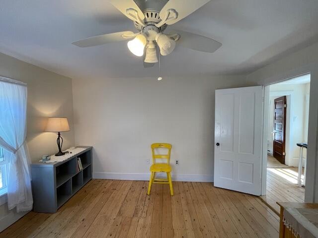 unfurnished room featuring wood-type flooring and ceiling fan