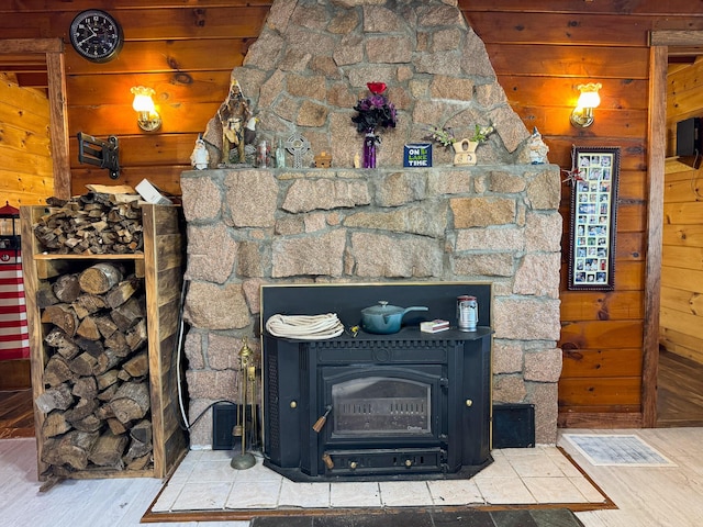 139 Lake Rd, Robbinston, ME 04671 - detailed view of wood finished floors, wooden walls, and a fireplace