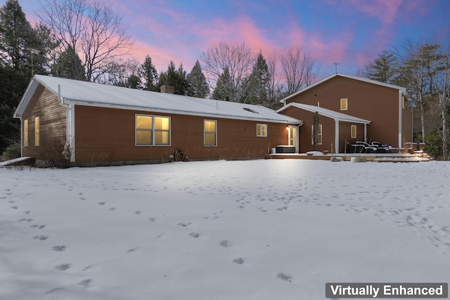 view of snow covered property