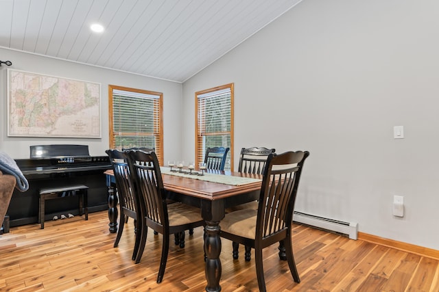 dining area with wood ceiling, a baseboard radiator, lofted ceiling, and light wood-type flooring