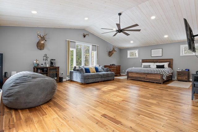 bedroom with wood ceiling, vaulted ceiling, ceiling fan, and light wood-type flooring