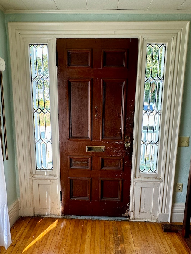 foyer with light hardwood / wood-style floors