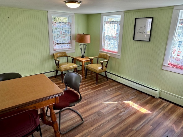 office area featuring hardwood / wood-style floors and a baseboard radiator