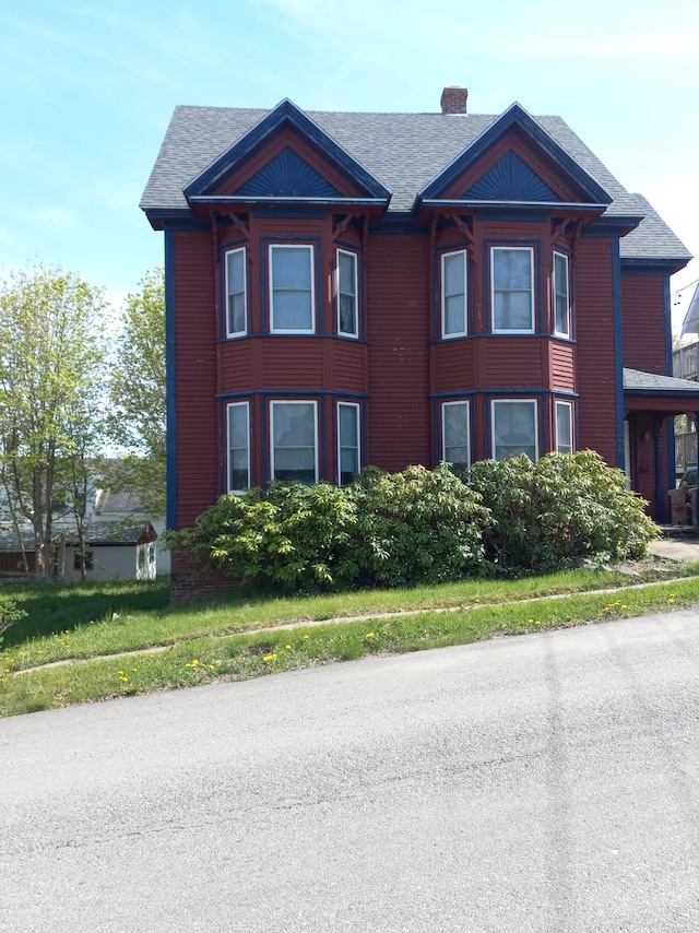 view of front of property featuring a chimney