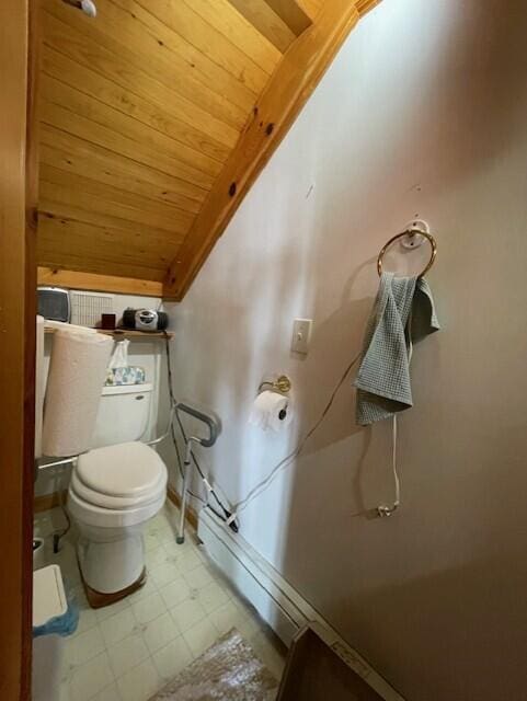 bathroom featuring lofted ceiling, toilet, tile patterned floors, and wooden ceiling