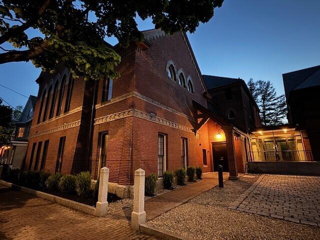 view of property exterior at dusk