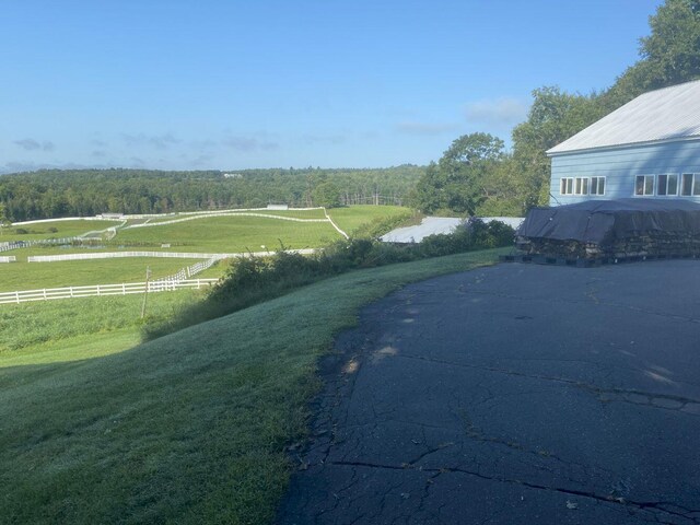 exterior space with a rural view