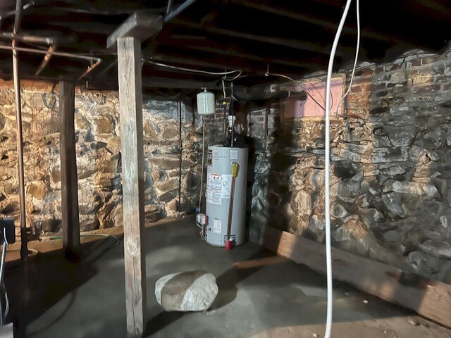 basement featuring water heater