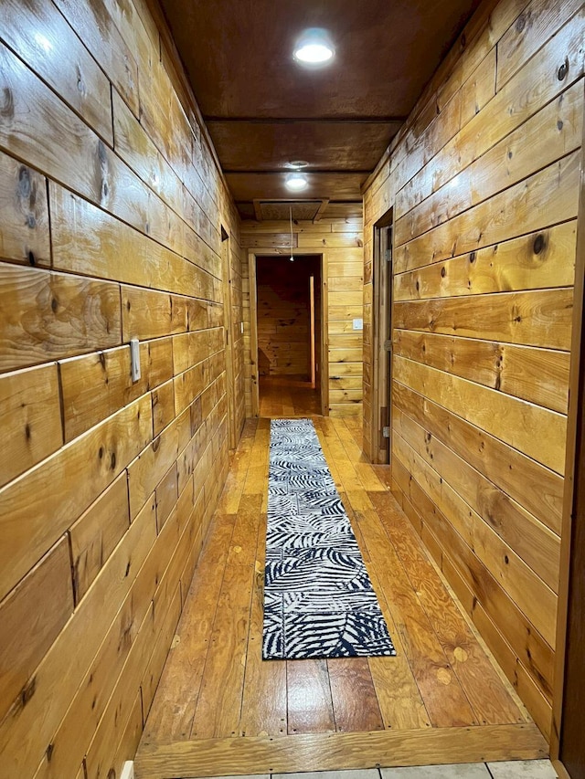 hallway with wooden walls