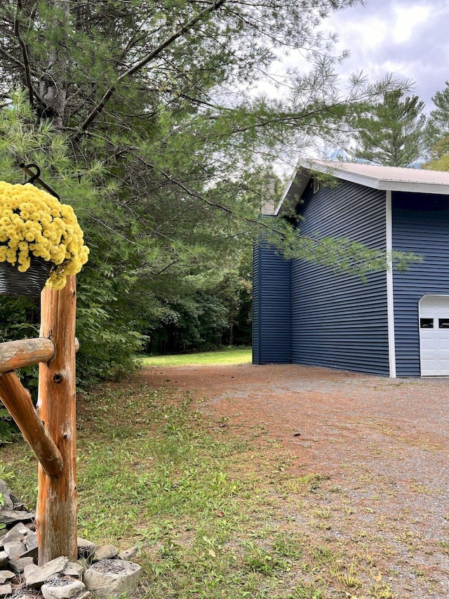 view of yard with a garage