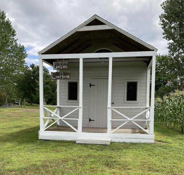 view of outdoor structure with a yard