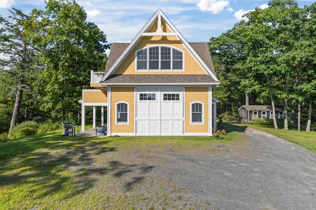 exterior space featuring an outbuilding and a yard