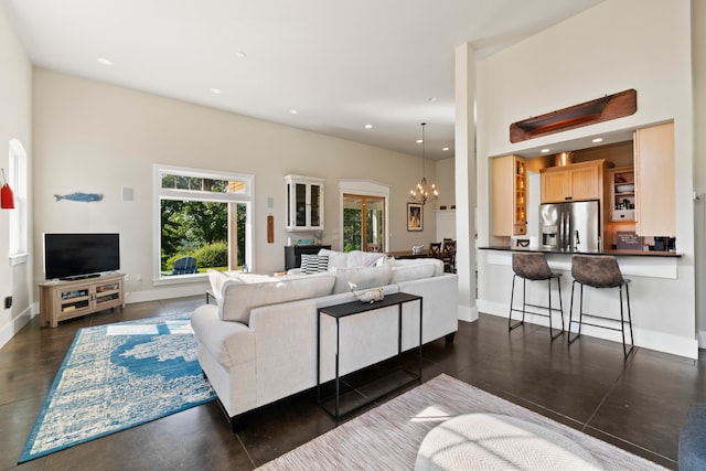 living room featuring a chandelier