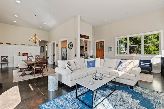 living room with an inviting chandelier