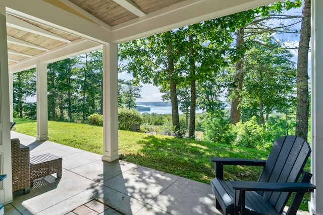 view of patio / terrace featuring a water view