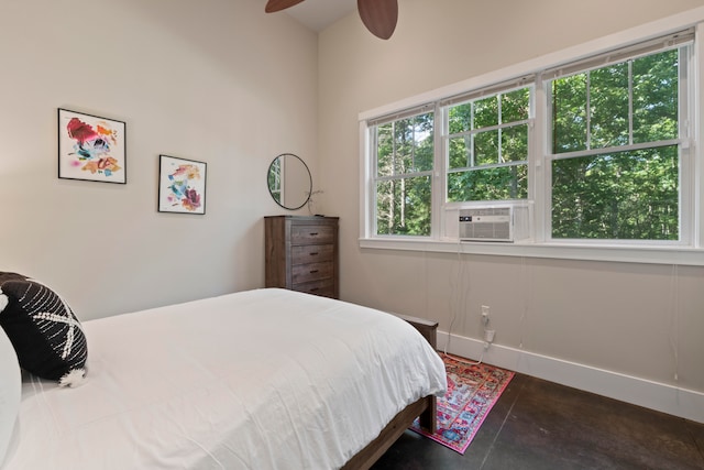 bedroom featuring ceiling fan and cooling unit