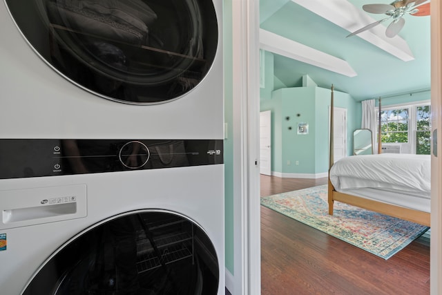 washroom with hardwood / wood-style floors, ceiling fan, and stacked washer and dryer