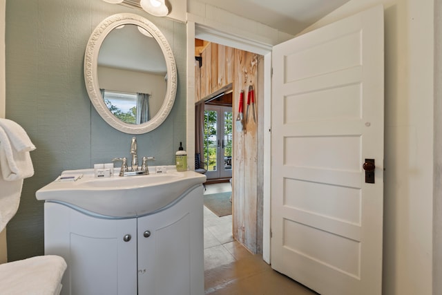 bathroom featuring tile patterned floors and vanity