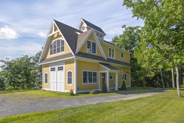 view of front of house with a front lawn