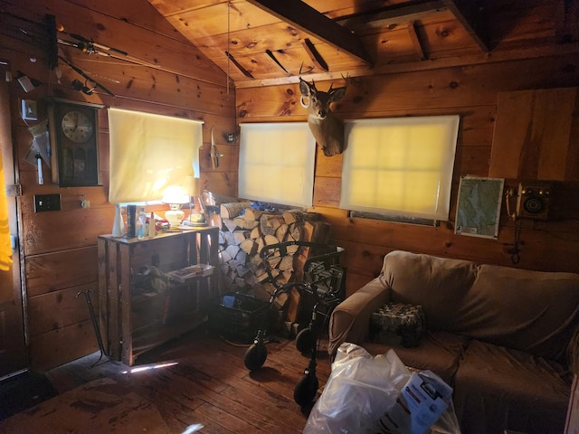 living room with vaulted ceiling, hardwood / wood-style floors, wood walls, and wood ceiling