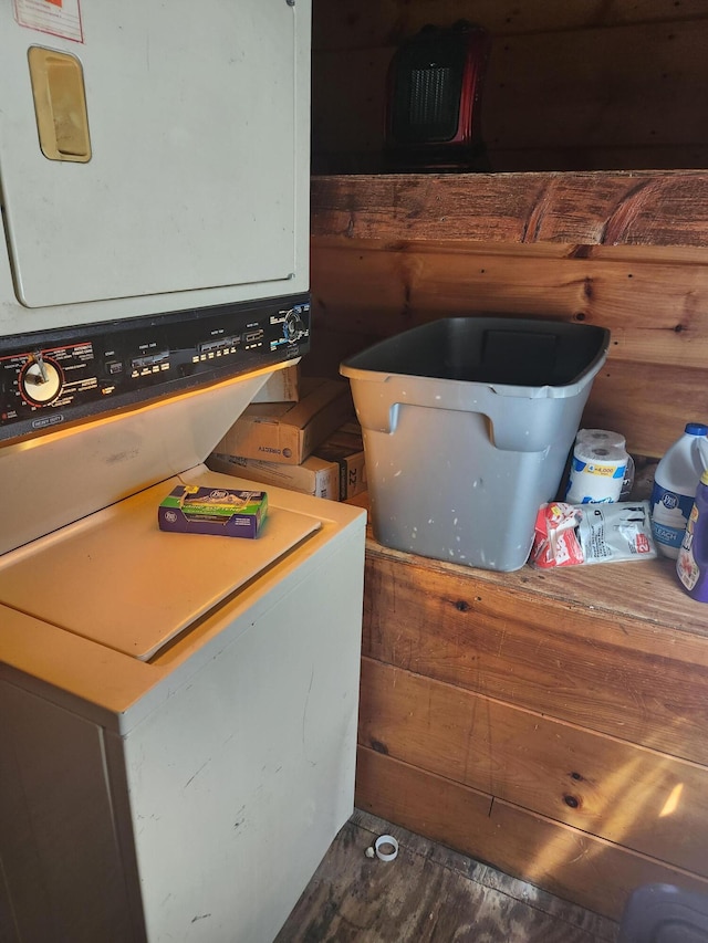 interior space featuring stacked washer / drying machine