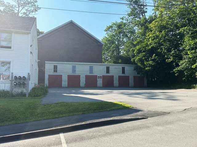 front of property with a garage