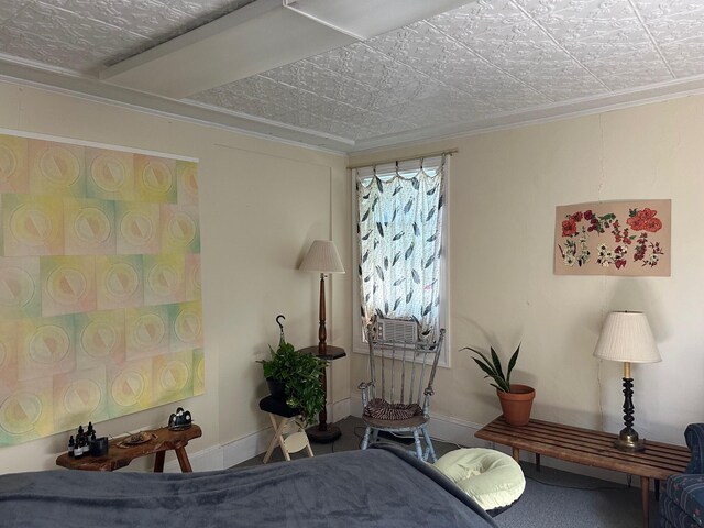 bedroom with ornamental molding and cooling unit