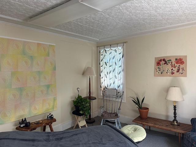 bedroom featuring baseboards and ornamental molding