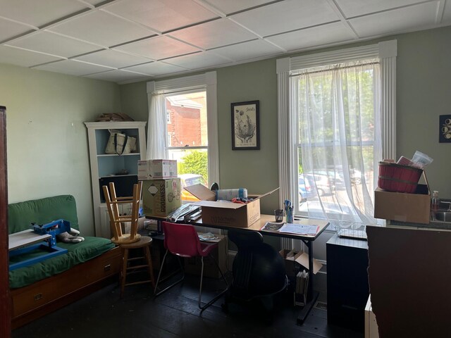 home office featuring a paneled ceiling