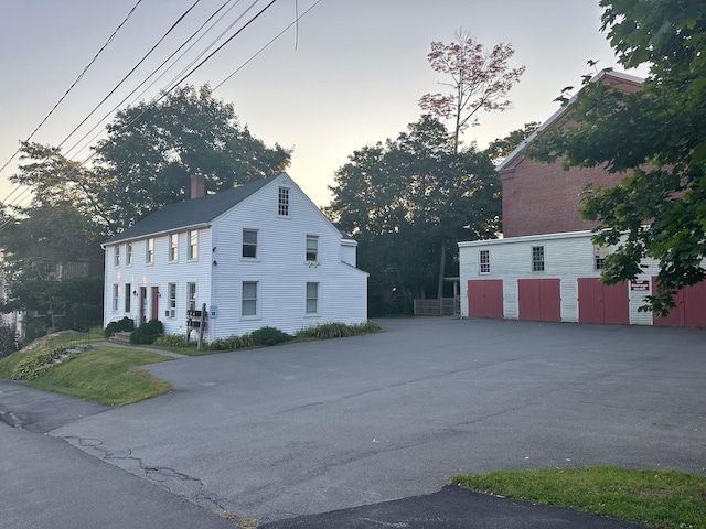 view of front of house with a chimney