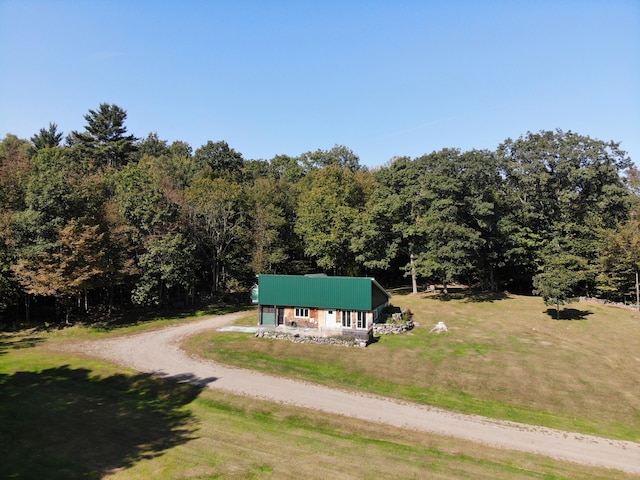 243 Lang Hill Hwy, Brooks, ME 04921 - view of subject property featuring a forest