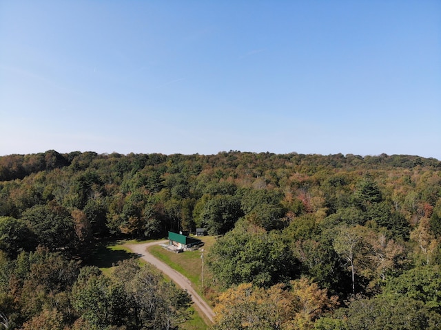 243 Lang Hill Hwy, Brooks, ME 04921 - aerial view of property's location featuring a heavily wooded area