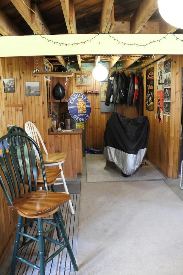 243 Lang Hill Hwy, Brooks, ME 04921 - basement with wooden walls and a sink