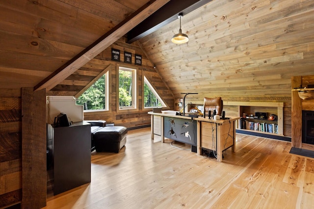additional living space with wooden walls, lofted ceiling with beams, light wood-style flooring, and wood ceiling