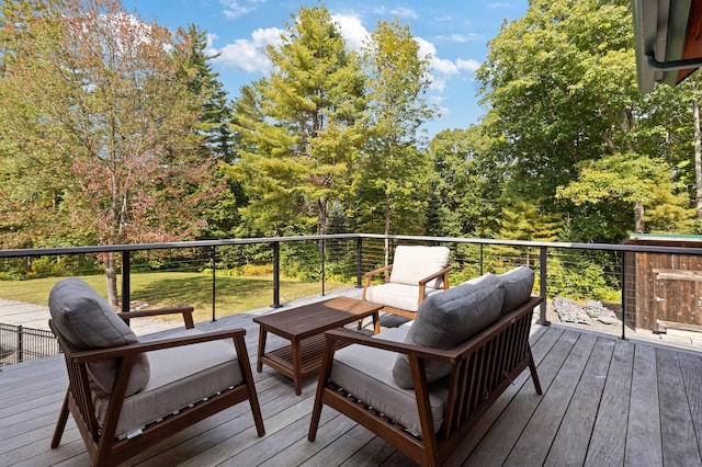wooden terrace featuring an outdoor hangout area