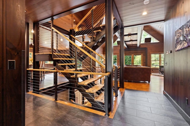 wine room with wooden ceiling, wooden walls, tile patterned flooring, and recessed lighting
