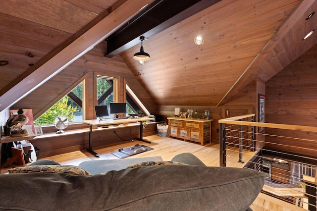 interior space featuring wooden walls, hardwood / wood-style flooring, vaulted ceiling with beams, and wooden ceiling