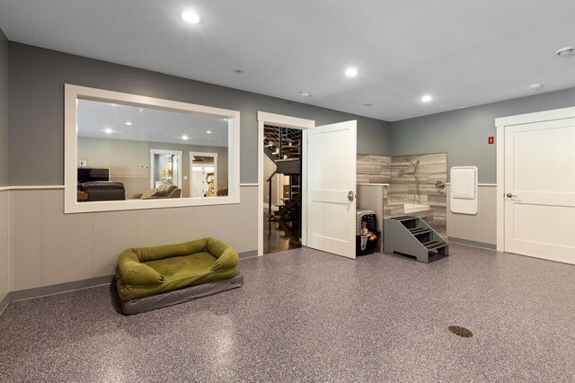 interior space featuring speckled floor and recessed lighting