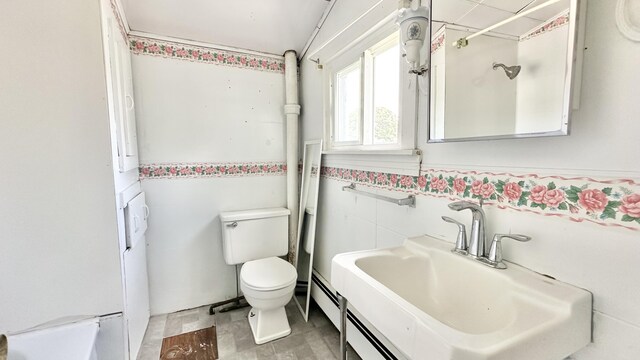 full bathroom with shower / tub combo with curtain, tile walls, toilet, sink, and hardwood / wood-style flooring