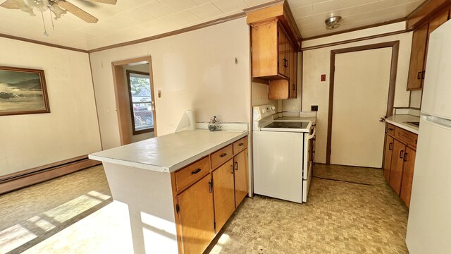 kitchen featuring washer / dryer, ceiling fan, and ornamental molding