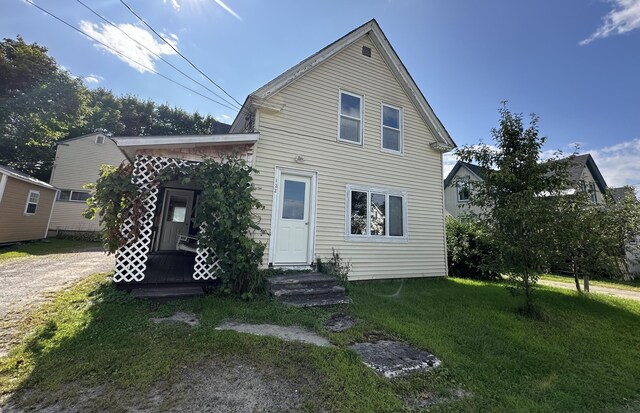 exterior space featuring a front yard