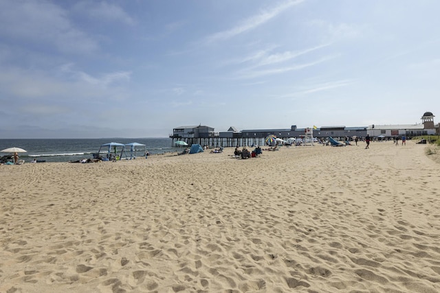 property view of water featuring a beach view