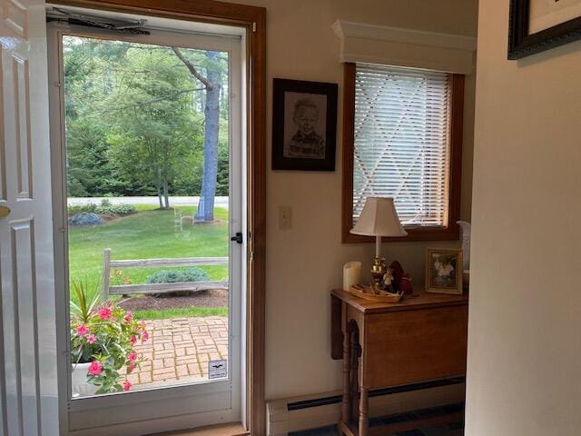 entryway with a baseboard heating unit