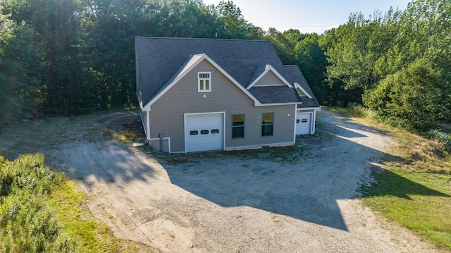 exterior space featuring central AC and dirt driveway