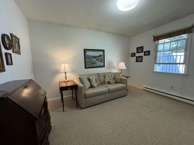 carpeted living room featuring a baseboard radiator and a textured ceiling