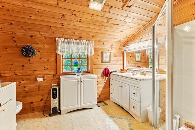 bathroom with a shower with door, vanity, wooden walls, and lofted ceiling