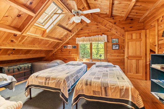 bedroom featuring wooden ceiling, hardwood / wood-style floors, lofted ceiling with skylight, and wooden walls