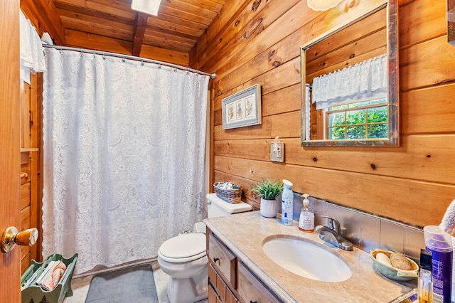 bathroom featuring wood walls, wood ceiling, toilet, and vanity