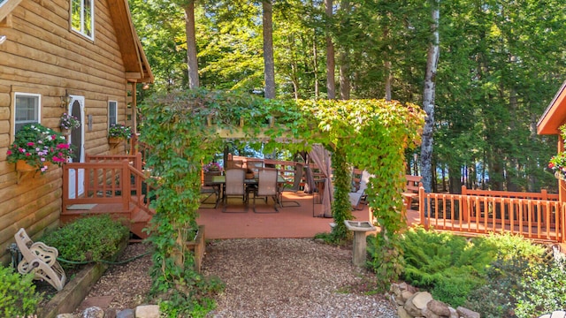 view of yard with a wooden deck